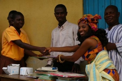 Kay donates books at Berekuso School